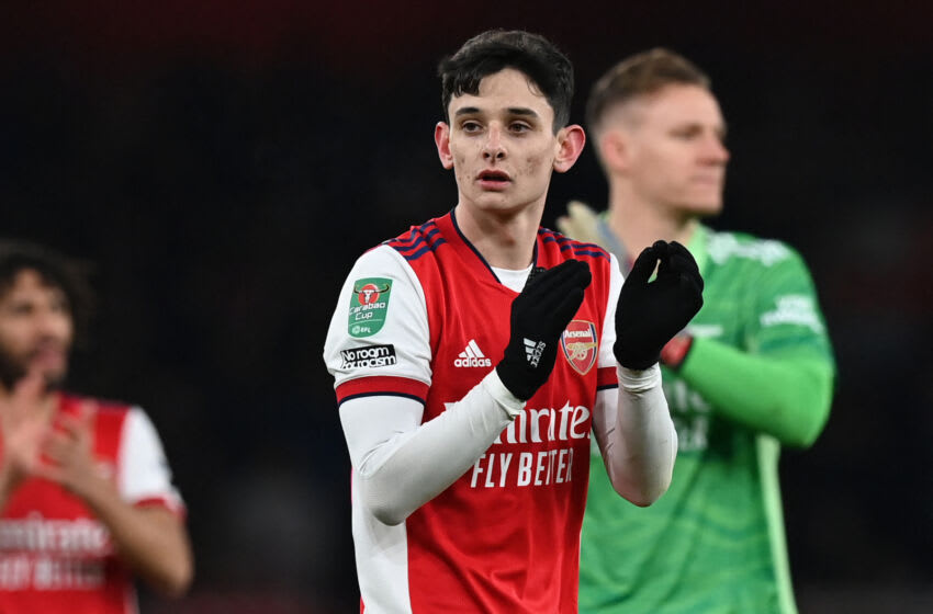 Arsenal's English midfielder Charlie Patino, who scored a goal on his debut, applauds supporters on the pitch after the English League Cup quarter-final football match between Arsenal and Sunderland at the Emirates Stadium in London on December 21, 2021. - Arsenal won the game 5-1. - RESTRICTED TO EDITORIAL USE. No use with unauthorized audio, video, data, fixture lists, club/league logos or 'live' services. Online in-match use limited to 120 images. An additional 40 images may be used in extra time. No video emulation. Social media in-match use limited to 120 images. An additional 40 images may be used in extra time. No use in betting publications, games or single club/league/player publications. (Photo by Glyn KIRK / AFP) / RESTRICTED TO EDITORIAL USE. No use with unauthorized audio, video, data, fixture lists, club/league logos or 'live' services. Online in-match use limited to 120 images. An additional 40 images may be used in extra time. No video emulation. Social media in-match use limited to 120 images. An additional 40 images may be used in extra time. No use in betting publications, games or single club/league/player publications. / RESTRICTED TO EDITORIAL USE. No use with unauthorized audio, video, data, fixture lists, club/league logos or 'live' services. Online in-match use limited to 120 images. An additional 40 images may be used in extra time. No video emulation. Social media in-match use limited to 120 images. An additional 40 images may be used in extra time. No use in betting publications, games or single club/league/player publications. (Photo by GLYN KIRK/AFP via Getty Images)