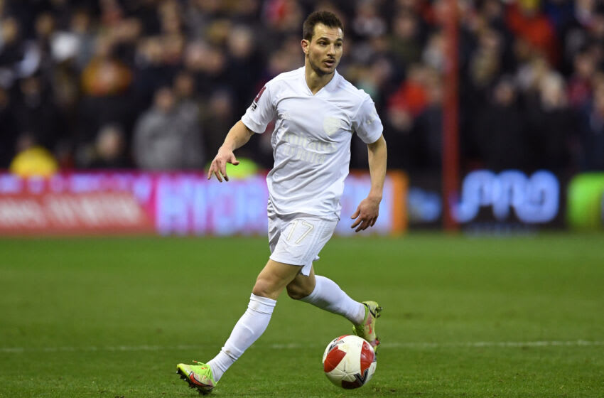 Arsenal's German-born Portuguese defender Cedric Soares is seen wearing a white kit to support the No More Red outreach and anti-knife crime initiative during the English FA Cup third round football match between Nottingham Forest and Arsenal at The City Ground in Nottingham, central England, on January 9, 2022. - - RESTRICTED TO EDITORIAL USE. No use with unauthorized audio, video, data, fixture lists, club/league logos or 'live' services. Online in-match use limited to 120 images. An additional 40 images may be used in extra time. No video emulation. Social media in-match use limited to 120 images. An additional 40 images may be used in extra time. No use in betting publications, games or single club/league/player publications. (Photo by Daniel LEAL / AFP) / RESTRICTED TO EDITORIAL USE. No use with unauthorized audio, video, data, fixture lists, club/league logos or 'live' services. Online in-match use limited to 120 images. An additional 40 images may be used in extra time. No video emulation. Social media in-match use limited to 120 images. An additional 40 images may be used in extra time. No use in betting publications, games or single club/league/player publications. / RESTRICTED TO EDITORIAL USE. No use with unauthorized audio, video, data, fixture lists, club/league logos or 'live' services. Online in-match use limited to 120 images. An additional 40 images may be used in extra time. No video emulation. Social media in-match use limited to 120 images. An additional 40 images may be used in extra time. No use in betting publications, games or single club/league/player publications. (Photo by DANIEL LEAL/AFP via Getty Images)