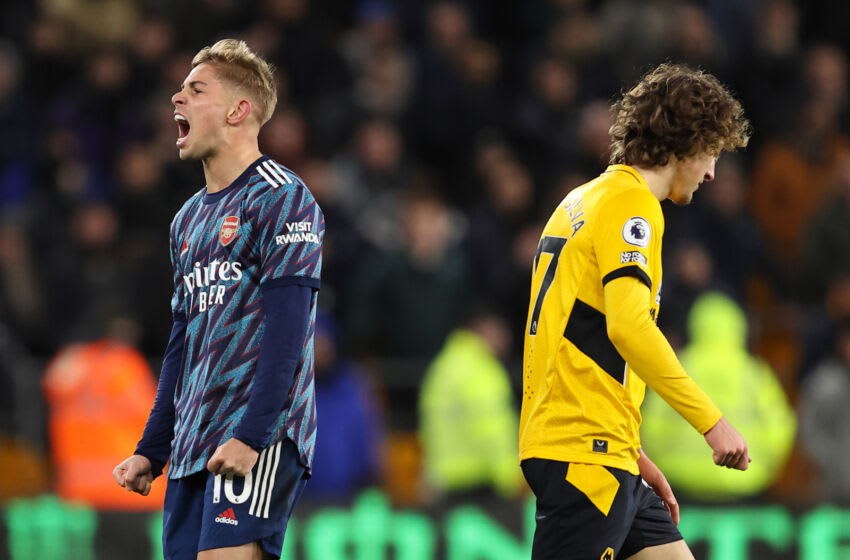 WOLVERHAMPTON, ENGLAND - FEBRUARY 10: Emile Smith Rowe of Arsenal celebrates at full time of the Premier League match between Wolverhampton Wanderers and Arsenal at Molineux on February 10, 2022 in Wolverhampton, United Kingdom. (Photo by James Williamson - AMA/Getty Images)