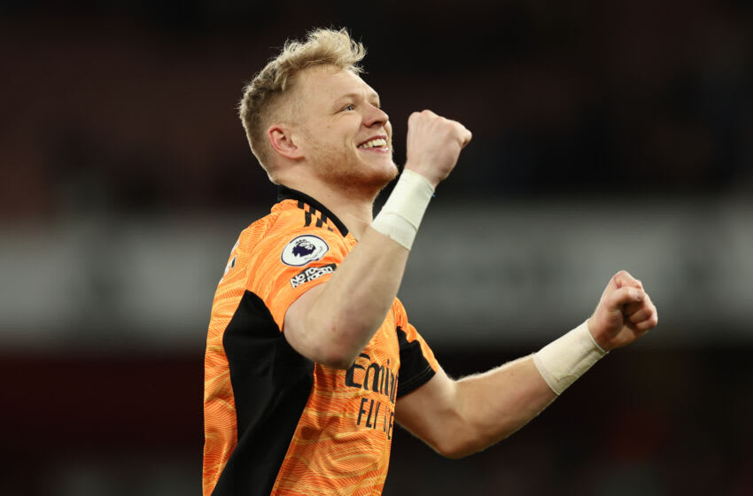 LONDON, ENGLAND - MARCH 13: Aaron Ramsdale of Arsenal celebrates at full time during the Premier League match between Arsenal and Leicester City at Emirates Stadium on March 12, 2022 in London, United Kingdom. (Photo by Matthew Ashton - AMA/Getty Images)