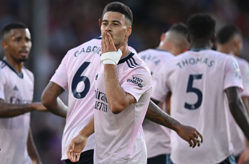 Arsenal's Brazilian midfielder Gabriel Martinelli (C) celebrates after scoring the opening goal in the English Premier League football match between Crystal Palace and Arsenal at Selhurst Park in south London on August 5, 2022. - RESTRICTED TO EDITORIAL USE. No use with unauthorized audio, video, data, fixture lists, club/league logos or 'live' services. Online in-match use limited to 120 images. An additional 40 images may be used in extra time. No video emulation. Social media in-match use limited to 120 images. An additional 40 images may be used in extra time. No use in betting publications, games or single club/league/player publications. (Photo by JUSTIN TALLIS / AFP) / RESTRICTED TO EDITORIAL USE. No use with unauthorized audio, video, data, fixture lists, club/league logos or 'live' services. Online in-match use limited to 120 images. An additional 40 images may be used in extra time. No video emulation. Social media in-match use limited to 120 images. An additional 40 images may be used in extra time. No use in betting publications, games or single club/league/player publications. / RESTRICTED TO EDITORIAL USE. No use with unauthorized audio, video, data, fixture lists, club/league logos or 'live' services. Online in-match use limited to 120 images. An additional 40 images may be used in extra time. No video emulation. Social media in-match use limited to 120 images. An additional 40 images may be used in extra time. No use in betting publications, games or single club/league/player publications. (Photo by JUSTIN TALLIS/AFP via Getty Images)