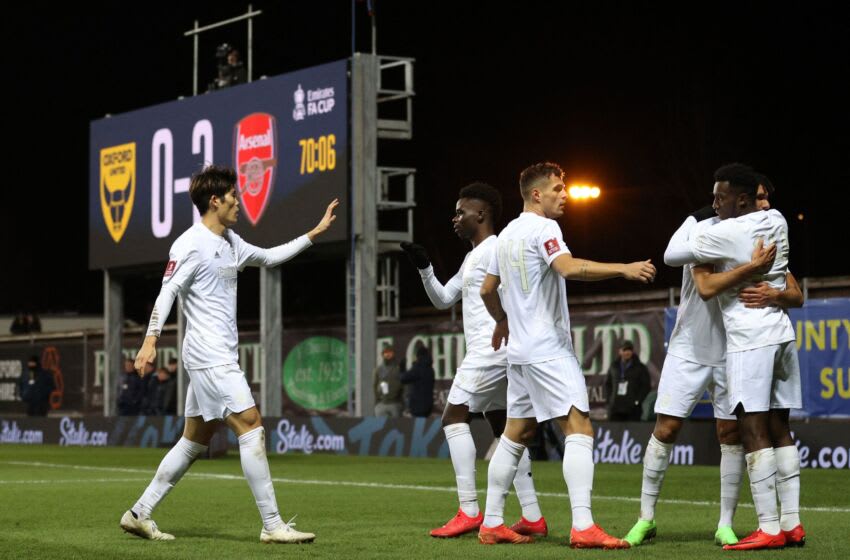 Arsenal's English striker Eddie Nketiah (R) celebrates after scoring his team second goal during the FA Cup third round football match between Oxford United and Arsenal at the Kassam Stadium in Oxford, west of London, on January 9, 2023. - RESTRICTED TO EDITORIAL USE. No use with unauthorized audio, video, data, fixture lists, club/league logos or 'live' services. Online in-match use limited to 120 images. An additional 40 images may be used in extra time. No video emulation. Social media in-match use limited to 120 images. An additional 40 images may be used in extra time. No use in betting publications, games or single club/league/player publications. (Photo by ADRIAN DENNIS / AFP) / RESTRICTED TO EDITORIAL USE. No use with unauthorized audio, video, data, fixture lists, club/league logos or 'live' services. Online in-match use limited to 120 images. An additional 40 images may be used in extra time. No video emulation. Social media in-match use limited to 120 images. An additional 40 images may be used in extra time. No use in betting publications, games or single club/league/player publications. / RESTRICTED TO EDITORIAL USE. No use with unauthorized audio, video, data, fixture lists, club/league logos or 'live' services. Online in-match use limited to 120 images. An additional 40 images may be used in extra time. No video emulation. Social media in-match use limited to 120 images. An additional 40 images may be used in extra time. No use in betting publications, games or single club/league/player publications. (Photo by ADRIAN DENNIS/AFP via Getty Images)