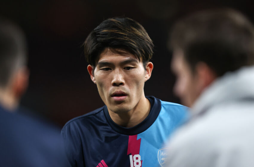 LONDON, ENGLAND - MARCH 16: Takehiro Tomiyasu of Arsenal warms up ahead of the UEFA Europa League round of 16 leg two match between Arsenal FC and Sporting CP at Emirates Stadium on March 16, 2023 in London, United Kingdom. (Photo by James Williamson - AMA/Getty Images)