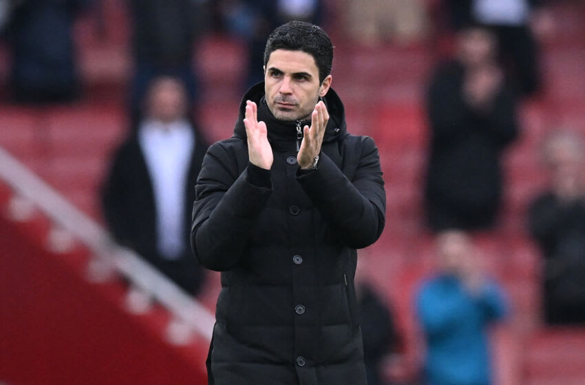 Arsenal's Spanish manager Mikel Arteta applauds fans on the pitch after the English Premier League football match between Arsenal and Leeds United at the Emirates Stadium in London on April 1, 2023. - Arsenal won the game 4-1. (Photo by Glyn KIRK / AFP) / RESTRICTED TO EDITORIAL USE. No use with unauthorized audio, video, data, fixture lists, club/league logos or 'live' services. Online in-match use limited to 120 images. An additional 40 images may be used in extra time. No video emulation. Social media in-match use limited to 120 images. An additional 40 images may be used in extra time. No use in betting publications, games or single club/league/player publications. / (Photo by GLYN KIRK/AFP via Getty Images)