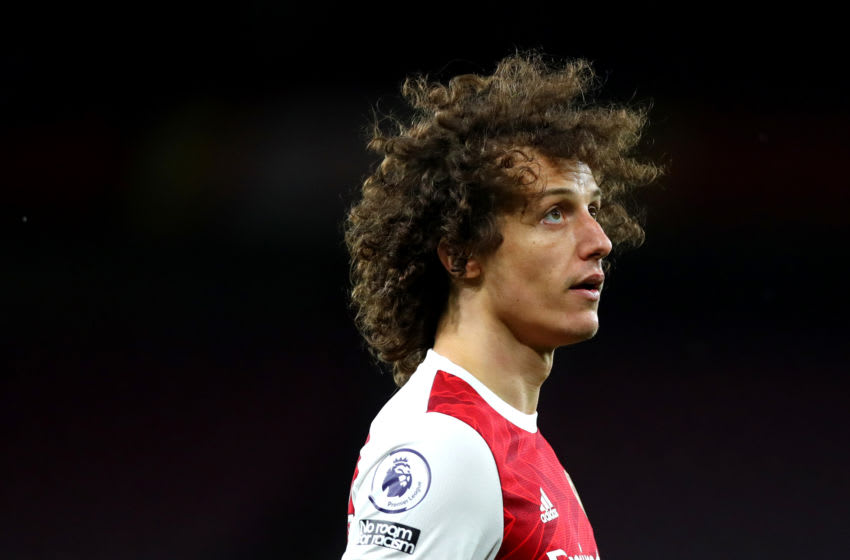 LONDON, ENGLAND - MARCH 14: David Luiz of Arsenal during the Premier League match between Arsenal and Tottenham Hotspur at Emirates Stadium on March 14, 2021 in London, England. Sporting stadiums around the UK remain under strict restrictions due to the Coronavirus Pandemic as Government social distancing laws prohibit fans inside venues resulting in games being played behind closed doors. (Photo by Chloe Knott - Danehouse/Getty Images)
