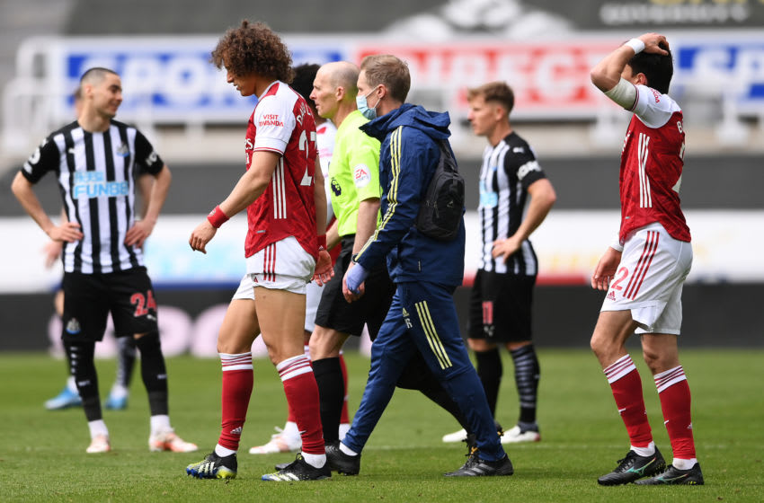 NEWCASTLE UPON TYNE, ENGLAND - MAY 02: David Luiz of Arsenal walks off injured during the Premier League match between Newcastle United and Arsenal at St. James Park on May 02, 2021 in Newcastle upon Tyne, England. Sporting stadiums around the UK remain under strict restrictions due to the Coronavirus Pandemic as Government social distancing laws prohibit fans inside venues resulting in games being played behind closed doors. (Photo by Stu Forster/Getty Images)