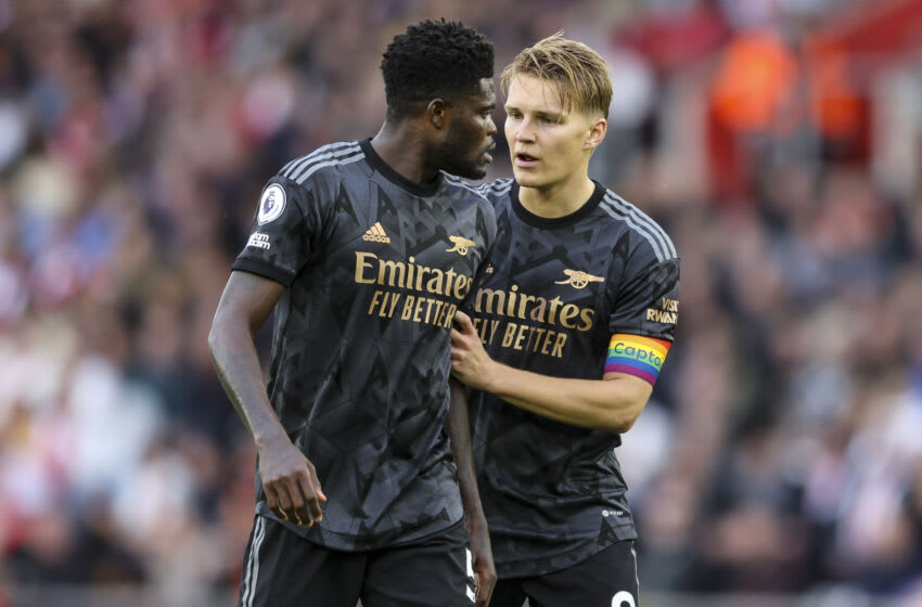 SOUTHAMPTON, ENGLAND - OCTOBER 23: Martin Ødegaard has a word with team-mate Thomas Partey of Arsenal during the Premier League match between Southampton FC and Arsenal FC at Friends Provident St. Mary's Stadium on October 23, 2022 in Southampton, England. (Photo by Robin Jones/Getty Images)