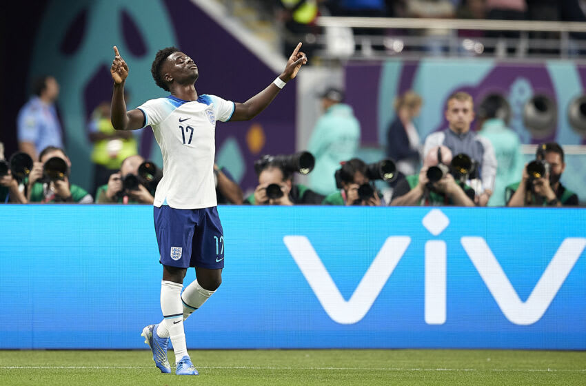 DOHA, QATAR - NOVEMBER 21: Bukayo Saka of England celebrates after scoring his team's second goal during the FIFA World Cup Qatar 2022 Group B match between England and IR Iran at Khalifa International Stadium on November 21, 2022 in Doha, Qatar. (Photo by Juan Luis Diaz/Quality Sport Images/Getty Images)