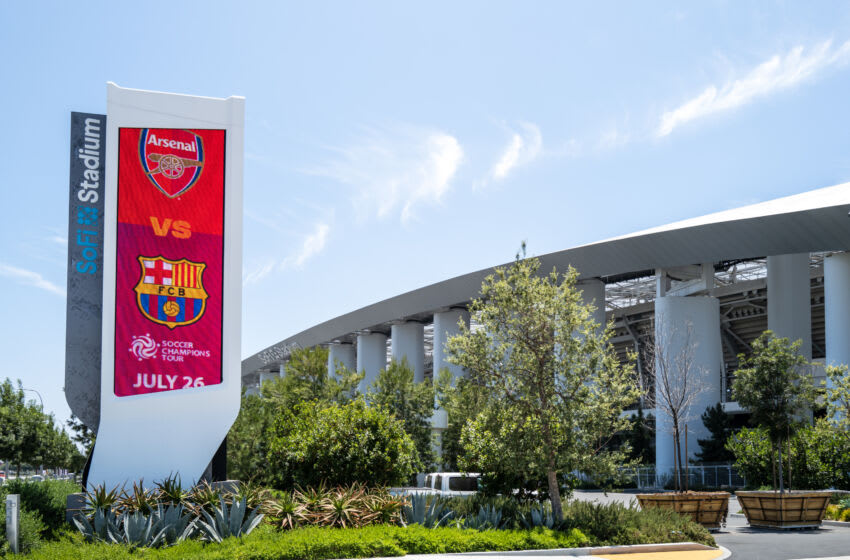 INGLEWOOD, CALIFORNIA - JULY 16: A general view of the SoFi Stadium home of the Los Angeles Rams and Los Angeles Chargers and a venue for the FIFA World Cup 2026 advertising the pre-season tour picture between Arsenal v Barcelona on July 26 during the Concacaf Gold Cup final match between Mexico and Panama at SoFi Stadium on July 16, 2023 in Inglewood, California. (Photo by Matthew Ashton - AMA/Getty Images)