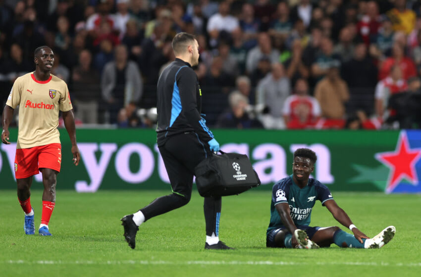 LENS, FRANCE - OCTOBER 03: Bukayo Saka of Arsenal reacts before being substituted during the UEFA Champions League match between RC Lens and Arsenal FC at Stade Bollaert-Delelis on October 03, 2023 in Lens, France. (Photo by Alex Pantling/Getty Images)