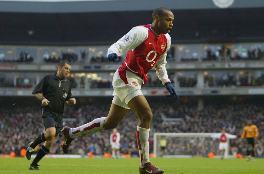 LONDON - DECEMBER 26: Thierry Henry of Arsenal celebrates scoring his second goal during the FA Barclaycard Premiership match between Arsenal and Wolverhampton Wanderers at Highbury on December 26, 2003 in London. (Photo by Clive Mason/Getty Images)