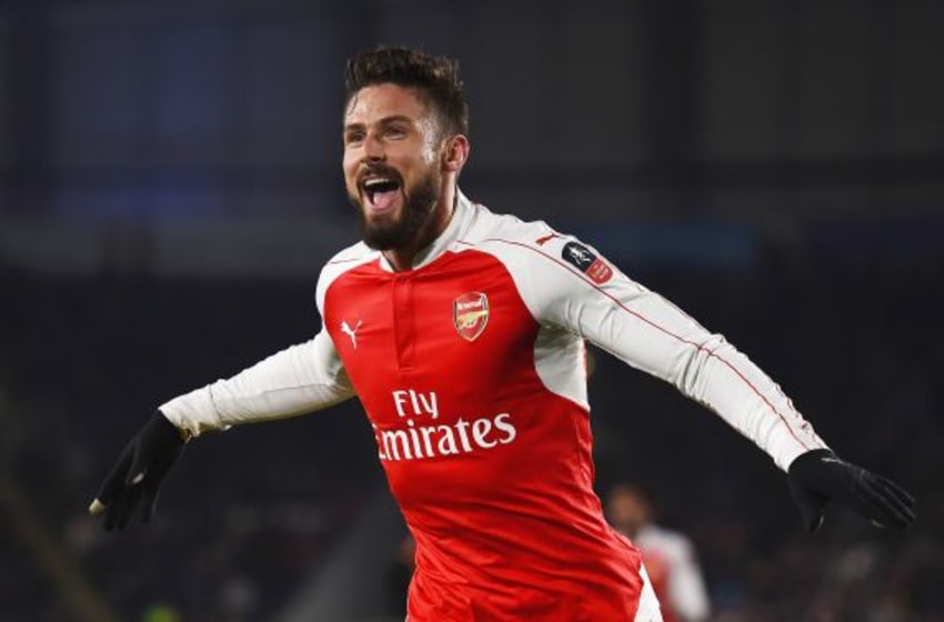 HULL, ENGLAND - MARCH 08: Olivier Giroud of Arsenal celebrates scoring the second Arsenal goal during the Emirates FA Cup Fifth Round Replay match between Hull City and Arsenal at KC Stadium on March 8, 2016 in Hull, England. (Photo by Laurence Griffiths/Getty Images)